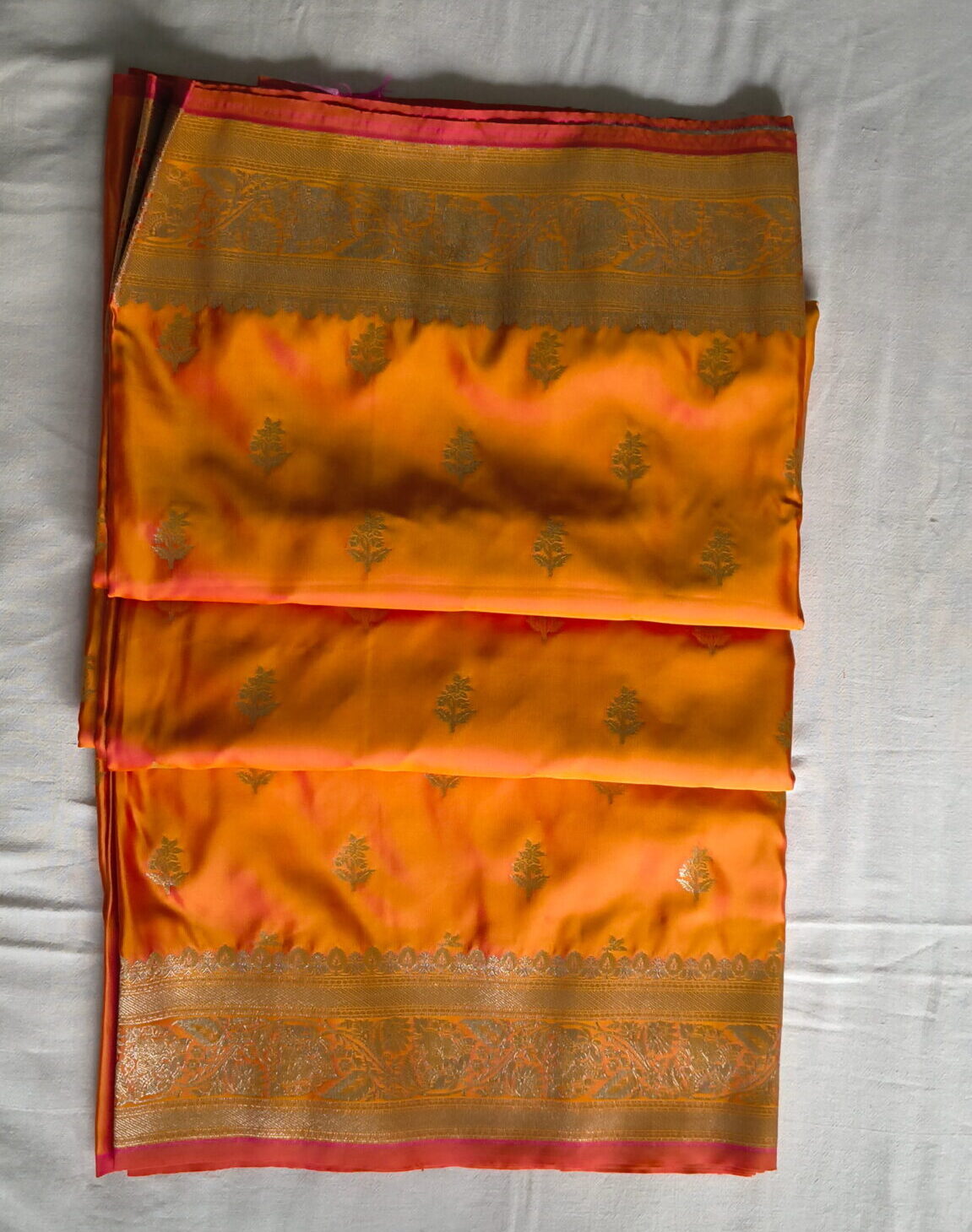 Radiant Orange Banarasi Kattan Silk Saree with Gold Zari Weaving