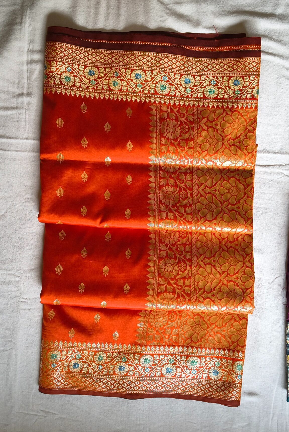 Vibrant Orange Banarasi Silk Saree with Meenakari Floral Border